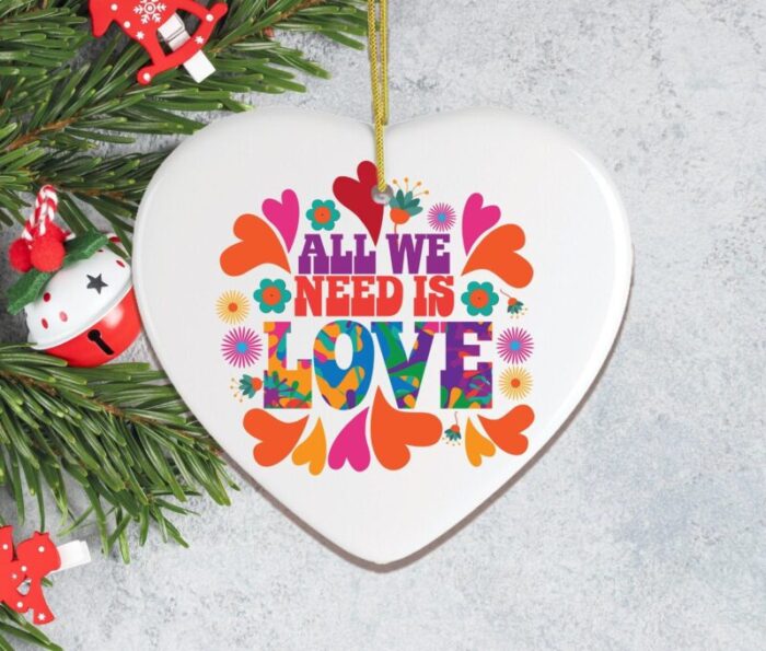 AllWeNeedisLoveOrnament 1960sHippyPsychedelicStyleChristmasDecorationGreyWallChristmasMockup